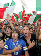 ITALIAN TIFOSI... WE ARE THE FOOTBALL SOCCER WORLD CHAMPIONS... For only the second time in World Cup history, the final was settled on a penalty shootout. Fabio Grosso, the goal hero in the semifinal against Germany, scored the winning penalty for four-time champions Italy... Materazzi had been busy at both ends of the field. The Italian defender conceded a penalty and scored a goal in the first half to even the match against France at 1-1 in the World Cup final