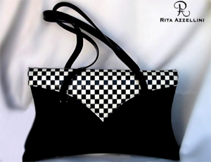 Disegnata e prodotta interamente a mano in Italia, la collezione Rita Azzellini � studiata apposta per la Donna esigente che ama l'esclusivit� e l'eleganza, in ogni sua forma; una Donna che non baratta la propria personalit� con le tendenze del momento. Sia nella quotidianit� di tutti i giorni che nell'evento di una cerimonia o di un'occasione speciale, una borsa Rita Azzellini sa trasformarsi da utile oggetto a fine corredo di un abbigliamento e di un proprio essere che sa e vuole farsi ammirare